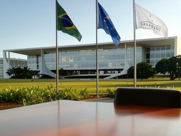 Bandeiras do Brasil, UE e Mercosul no Palácio do Planalto, simbolizando compromisso com acordo comercial em carta a Lula.