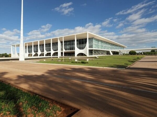 Vista do Palácio do Planalto em Brasília com bandeira brasileira, representando a corrida presidencial de 2026.