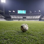Campo de futebol com placar de empate 1-1 em estádio brasileiro, simbolizando despedida da Copinha 2026 sem vitórias.